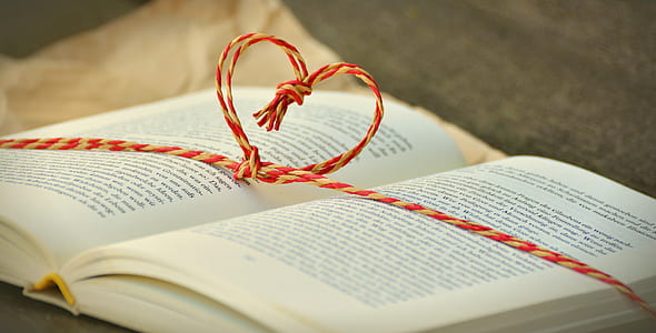 book with heart strings thumbnail