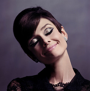 fashion photography of woman wearing smokey double cut crease eyeshadow and pinkish-nude lipstick thumbnail