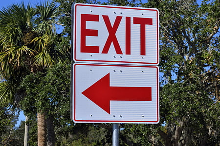 white-and-red exit with arrow road signages thumbnail