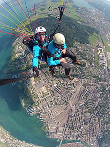 two person riding sky diving on parachute thumbnail