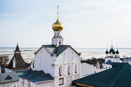 white buildings at daytime thumbnail