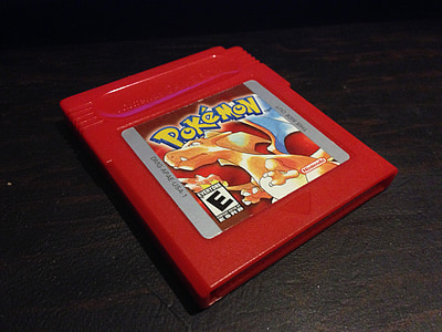 closeup photo of Pokemon Red game cartridge thumbnail
