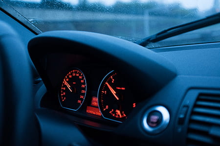 shallow focus photography of car speedometer thumbnail