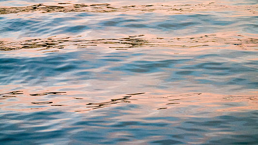 blue body of water during daytime thumbnail