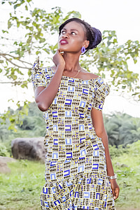 woman wearing yellow, blue and white scoop neck short sleeve bodycon dress fashion photography thumbnail