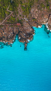 aerial view of island and body of water thumbnail
