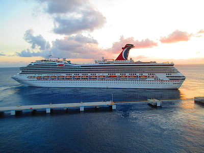 white cruise ship on blue ocean water thumbnail