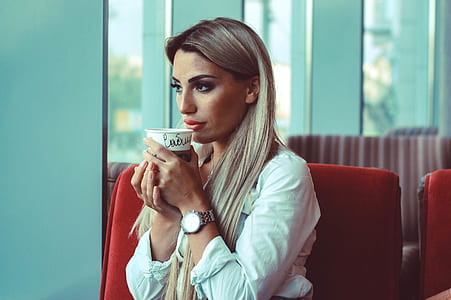 woman holding cup thumbnail