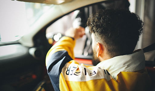 photo of man inside the car thumbnail