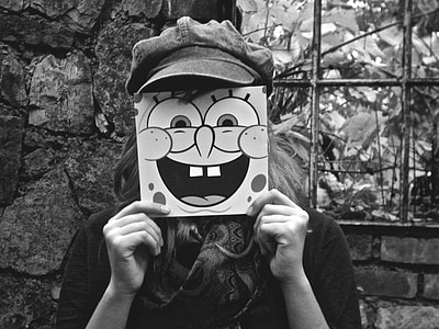 person holding Spongebob Squarepants-printed card thumbnail