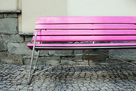 Wide angle shot of a vibrantly coloured pink bench in an urban setting, image captured with a Canon DSLR thumbnail