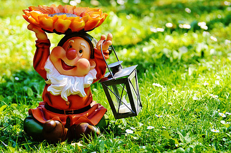 orange dwarf ceramic figurine thumbnail