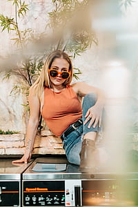 woman sitting on gray panel thumbnail