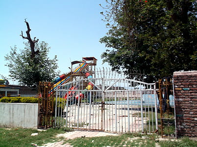 a far view of a swimming pool in park thumbnail