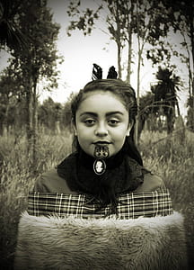gray scale photo of girl in brown jacket thumbnail