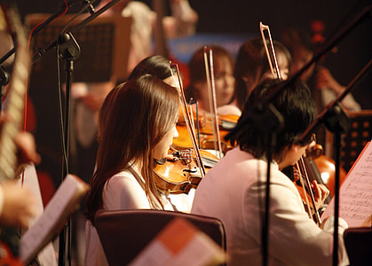 group of people playing musical instruments thumbnail