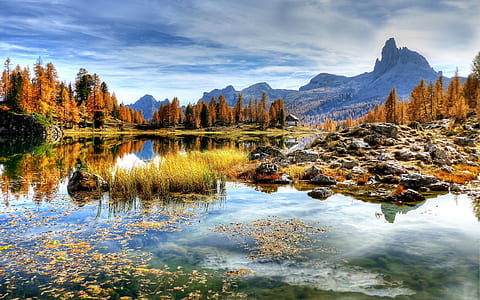 mountain near lake photography thumbnail