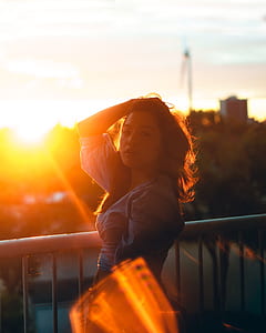 woman posing near handrail thumbnail