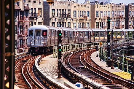 train moving near houses thumbnail