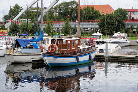 blue and white fishing vessel on deck thumbnail