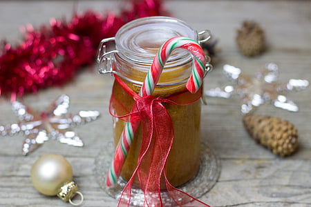 clear glass mason jar and candy cane thumbnail