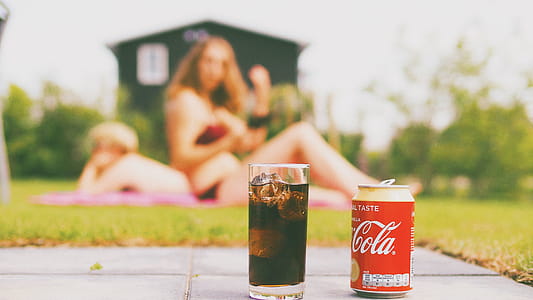 Coca-cola Can and Drinking Glass Filled With Coke thumbnail