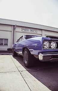 purple coupe near Photo Crafts store facade thumbnail