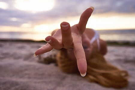 selective focus photography of woman's left hand thumbnail