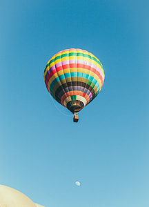 low angle photography of hot air balloon during day time thumbnail