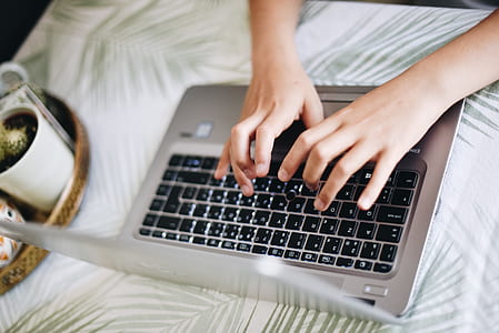 person using laptop and typing thumbnail