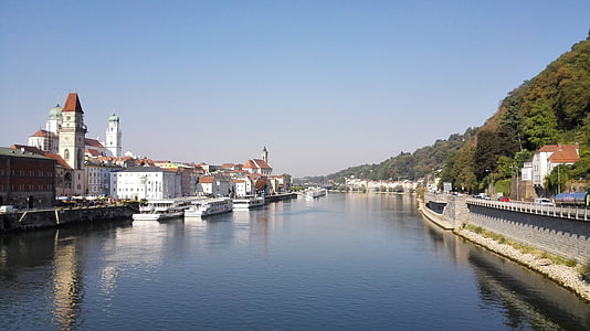 white passenger ship docked near building thumbnail