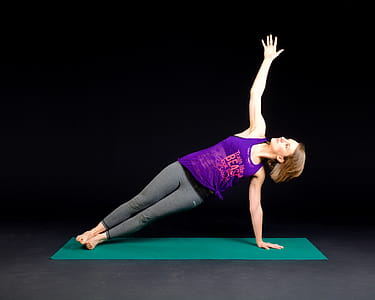 Woman in Purple Tank Top and Gray Sweat Pants thumbnail