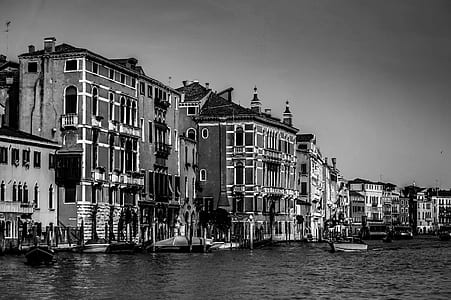 Concrete Houses Beside Body of Water thumbnail