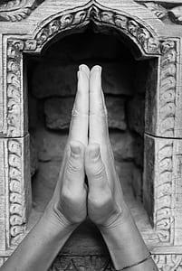 person touching palm against each other thumbnail