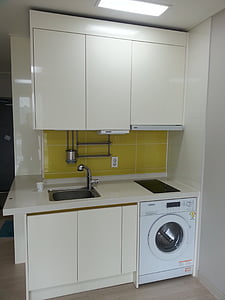 white kitchen cupboard, sink, and dishwasher thumbnail