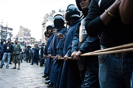 policemen barricade the streets during daytime thumbnail