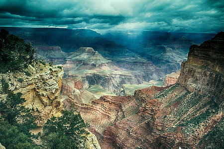aerial photography of brown and black rock formation during daytime thumbnail
