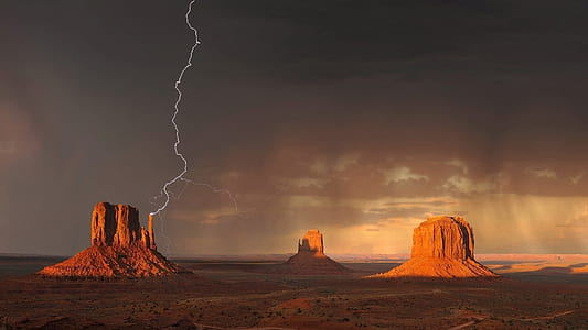 Grand Canyon Under Black Sky With Lightning during Daytime thumbnail