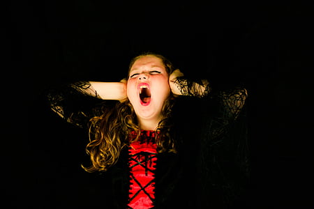 woman wearing red and black top thumbnail