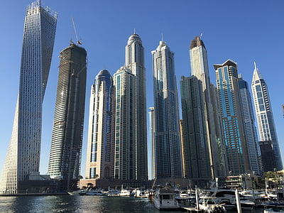 photography of gray high-rise building during daytime thumbnail