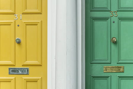 two green and yellow wooden doors thumbnail