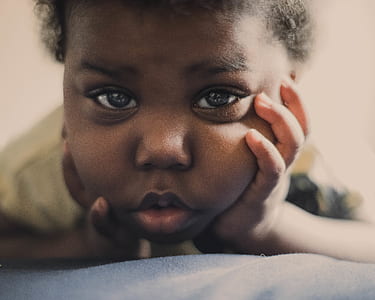 close-up photography of girl's face thumbnail