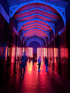people standing inside lighted dome thumbnail