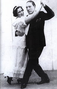 man and woman dancing near wall grayscale photo thumbnail
