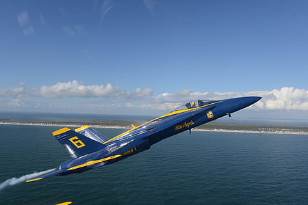 blue and yellow jet fighter about to take off thumbnail