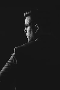 grayscale photo of a man in formal coat thumbnail
