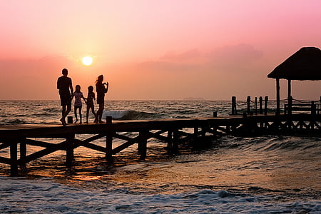 group of people on dock over the horizon thumbnail