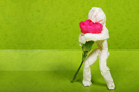red tulip flower with adhesive man decor thumbnail