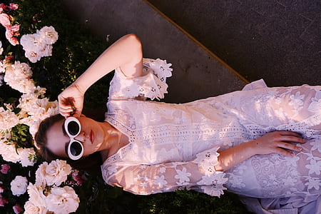 woman wearing white lace dress thumbnail