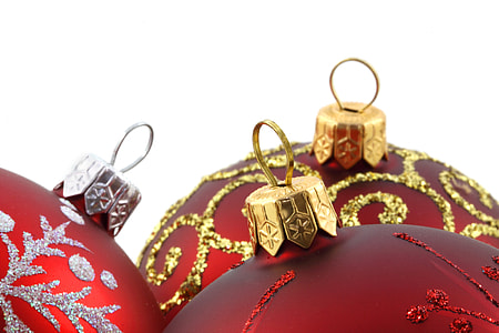 three red Christmas baubles thumbnail